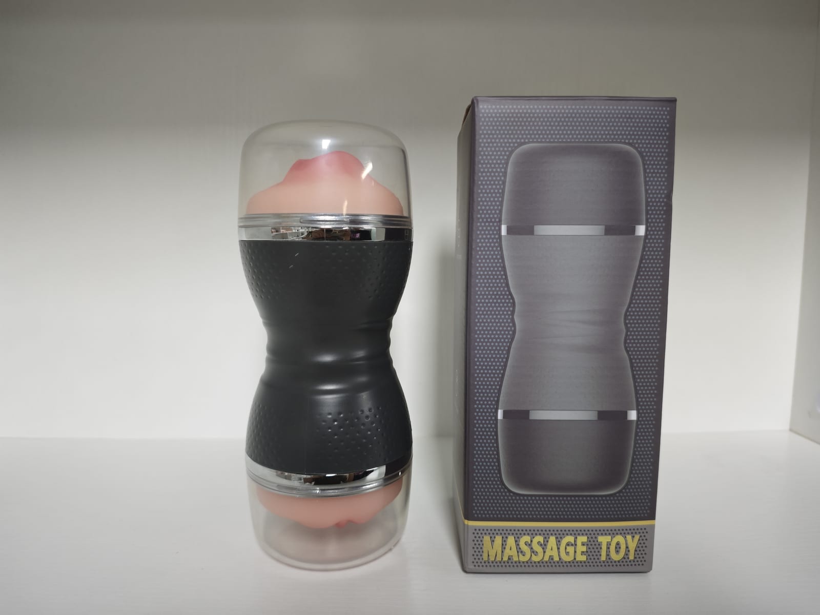 D23 dual-head personal device shown with its retail box